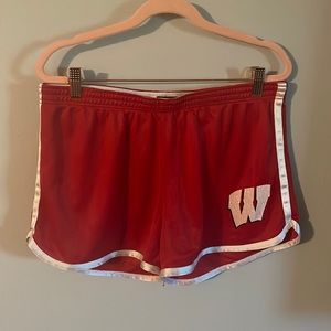 Red wisconsin mesh shorts with white trim. Pro edge size L